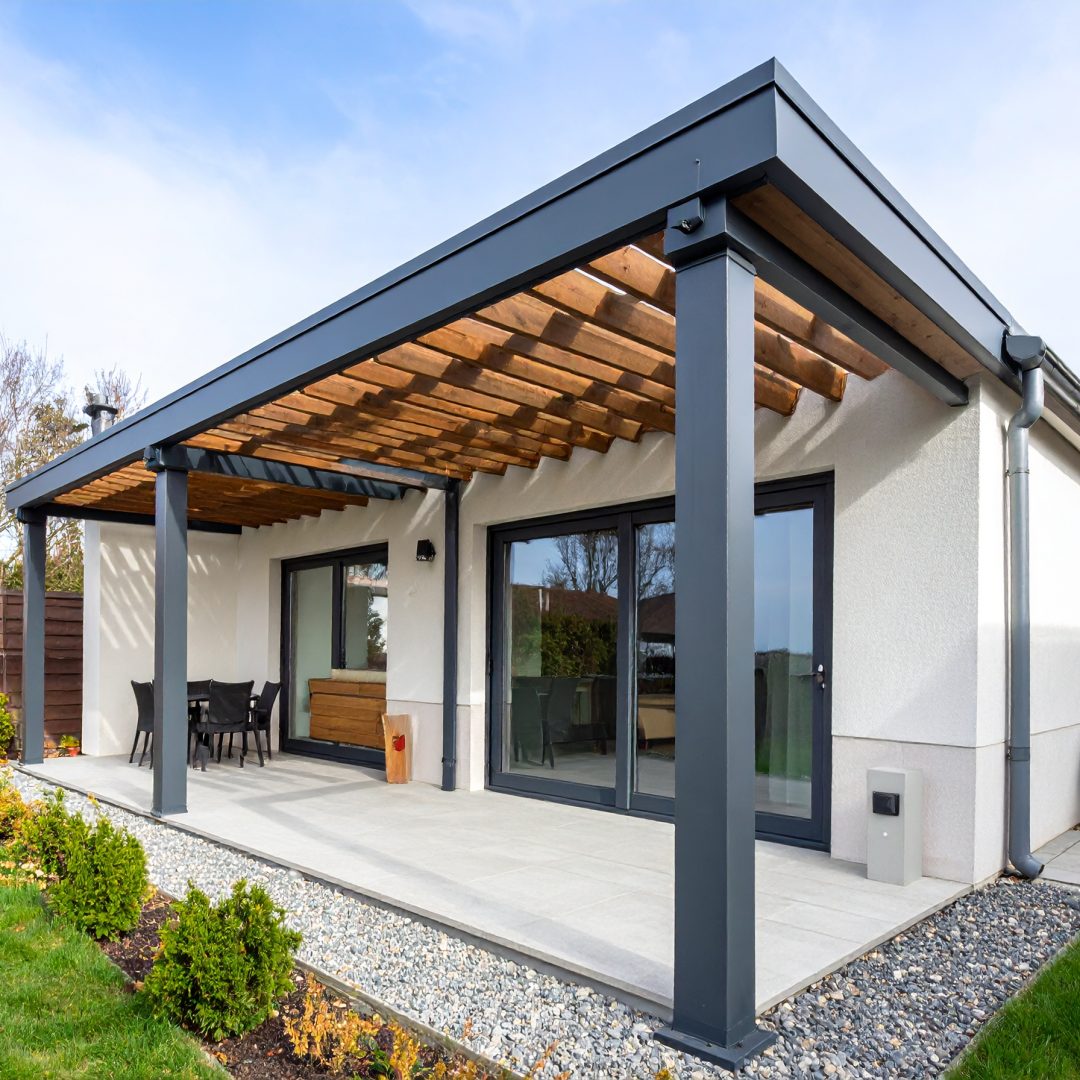 Firefly_Ultra-realistic photo of a wall-mounted pergola (pergola adossée) attached to the rea 95647